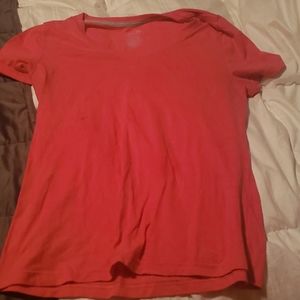 Pinkish red tone and tru tee shirt slight vee neck